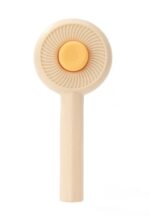 Pet brush with hair removal button standard shape